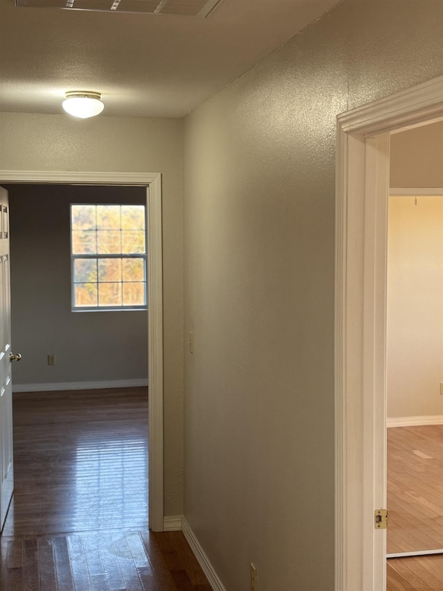 hall featuring dark hardwood / wood-style flooring