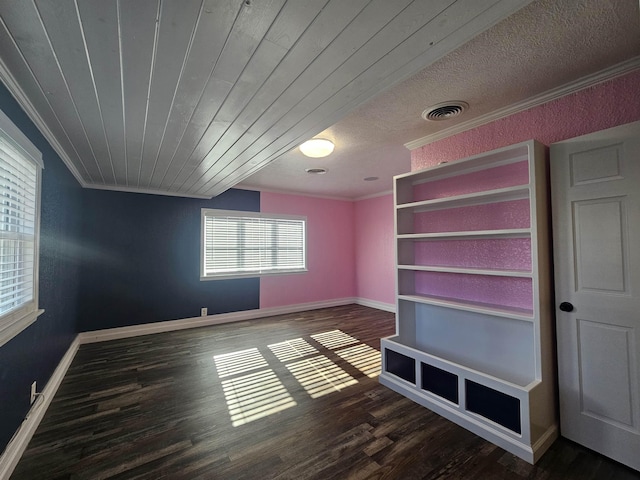 unfurnished bedroom featuring crown molding, wood ceiling, and dark hardwood / wood-style floors