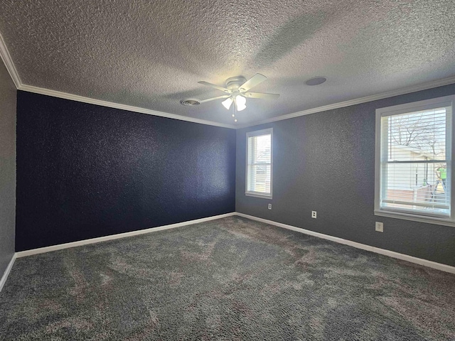 spare room with ornamental molding, carpet, a textured ceiling, and ceiling fan