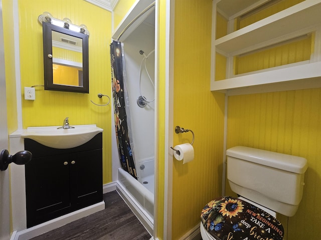 full bathroom featuring toilet, crown molding, vanity, shower / bath combo, and hardwood / wood-style flooring