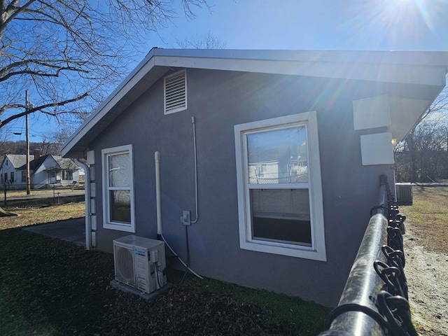 view of property exterior featuring ac unit