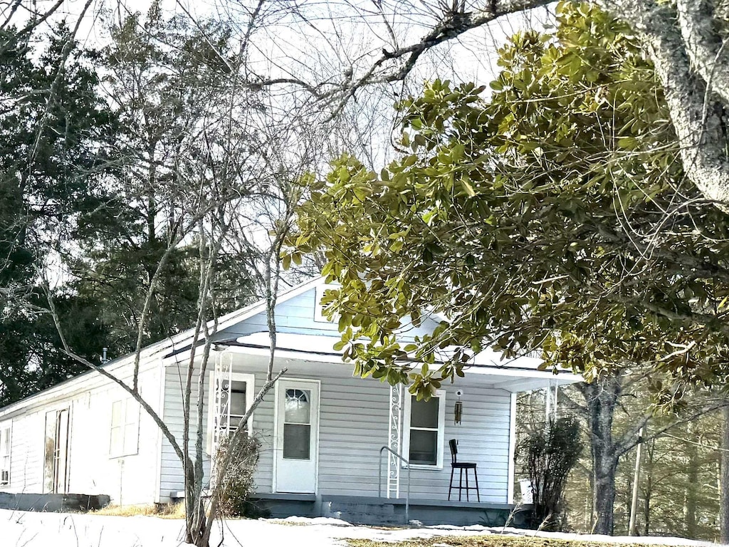 bungalow-style home featuring covered porch