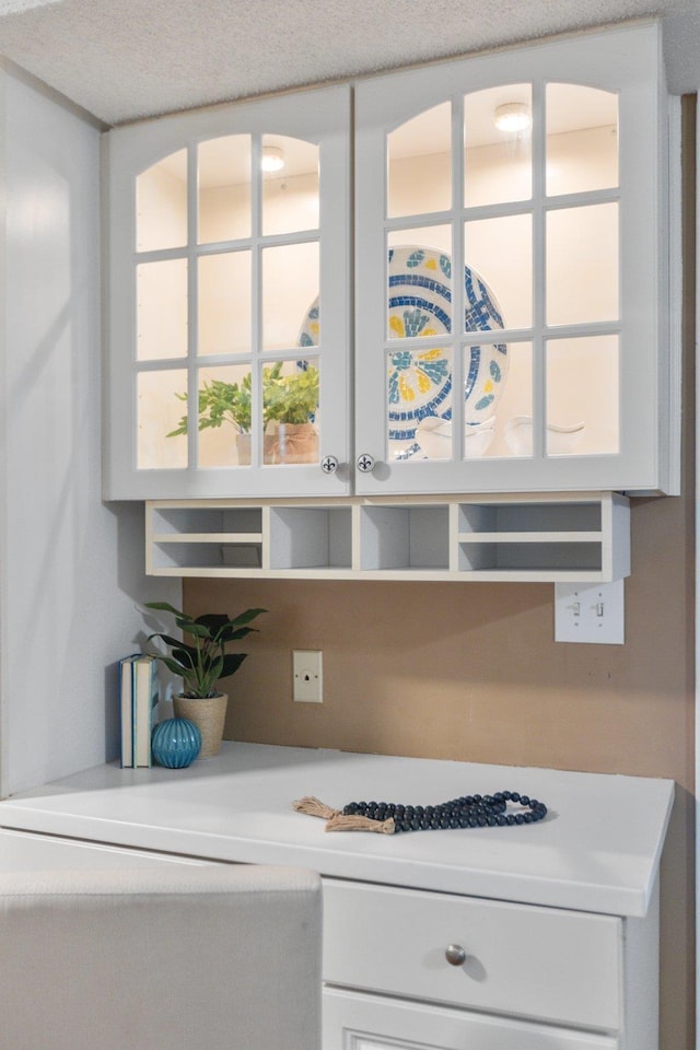 kitchen featuring white cabinetry