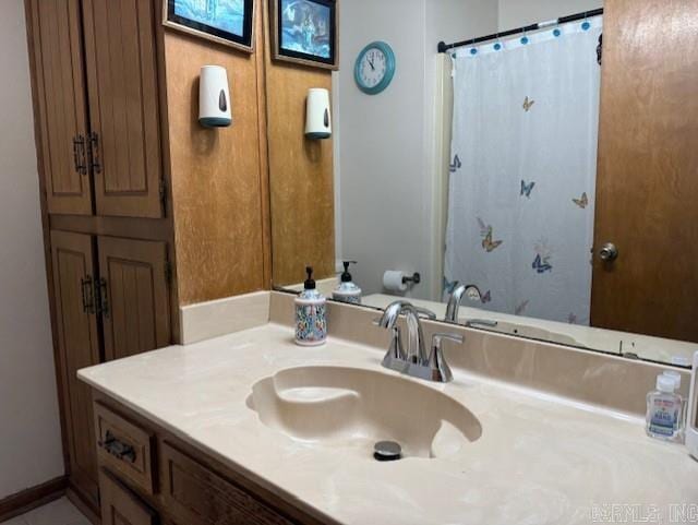 bathroom with vanity and walk in shower