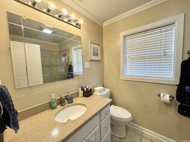 bathroom featuring tile patterned flooring, vanity, ornamental molding, toilet, and a textured ceiling