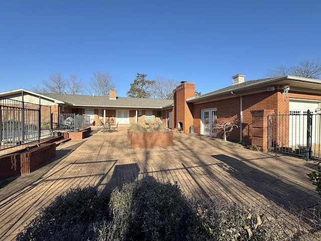 rear view of house featuring a patio