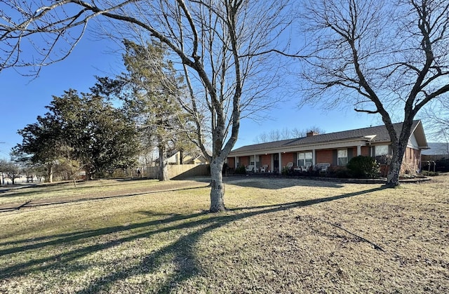 view of front facade featuring a front yard