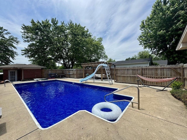 211 Service St, Mountain View, AR 72560 - view of pool featuring a fenced backyard, a patio area, a water slide, and an outdoor structure
