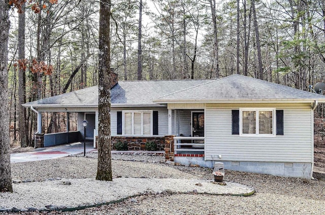 view of front of house with a carport