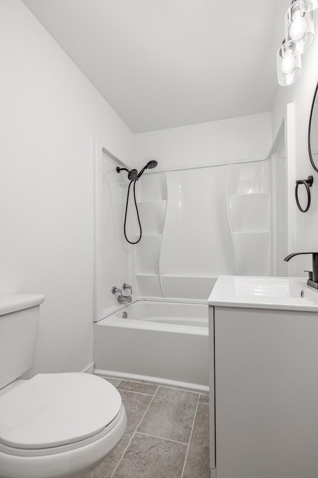 full bathroom with vanity, tile patterned floors, bathing tub / shower combination, and toilet