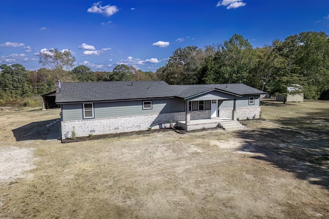 view of front of property featuring a patio