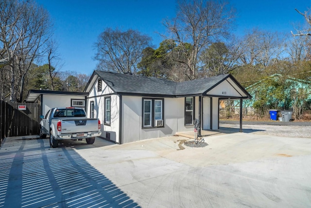 view of front of home featuring a carport