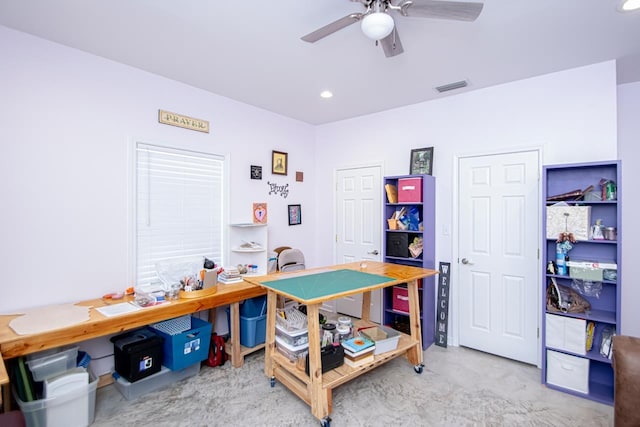 playroom with ceiling fan and concrete floors