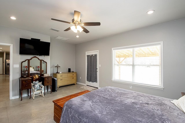 bedroom with stainless steel refrigerator with ice dispenser and ceiling fan