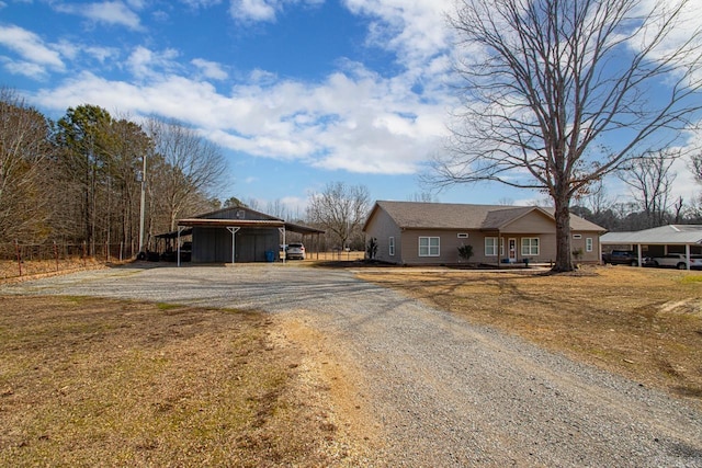 ranch-style home with a carport