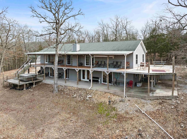 back of house with a patio area