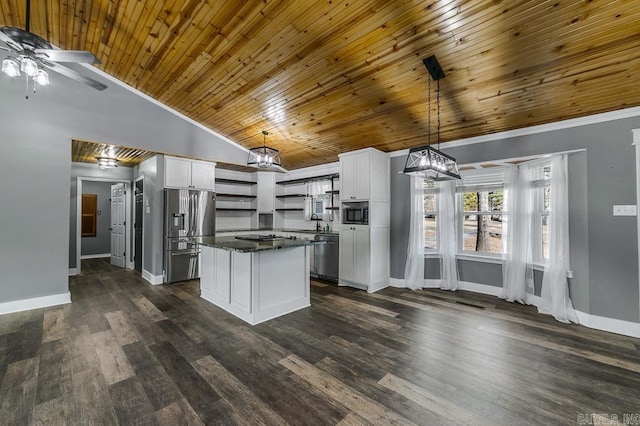 kitchen with wood ceiling, hanging light fixtures, stainless steel appliances, a center island, and white cabinets