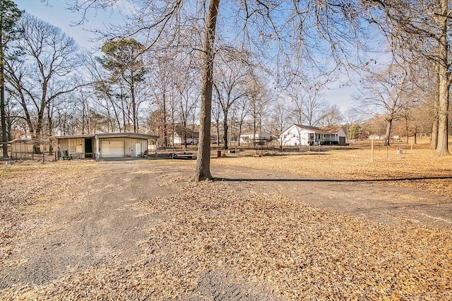 view of yard featuring a garage