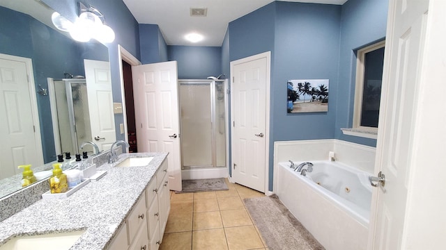 bathroom featuring tile patterned flooring, vanity, and independent shower and bath