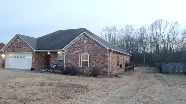 view of front of property featuring a garage