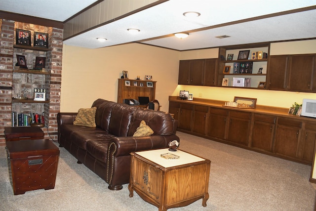 living room with light carpet and ornamental molding