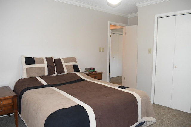 carpeted bedroom featuring ornamental molding and a closet