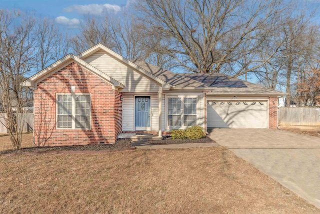 ranch-style home with a garage and a front lawn