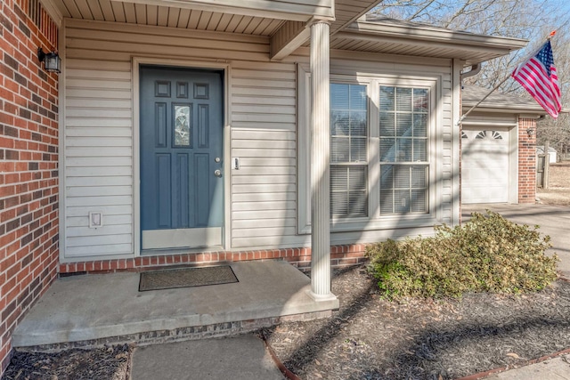 property entrance featuring a garage