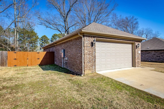 view of property exterior with a garage and a yard