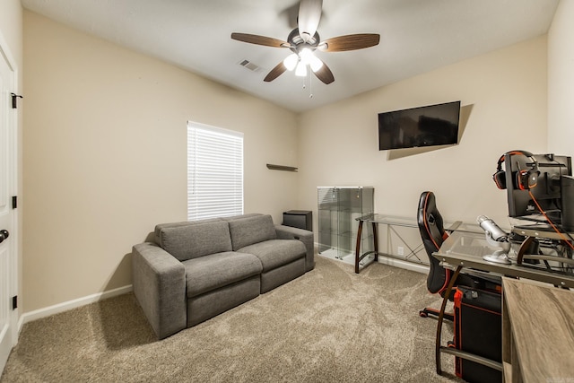 office space featuring carpet floors and ceiling fan