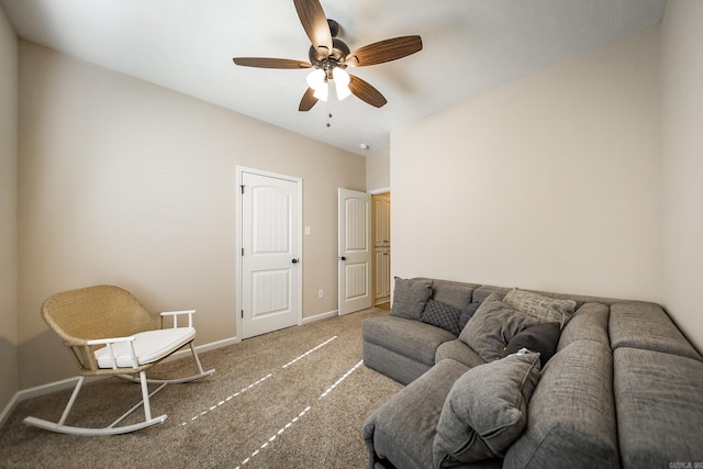 carpeted living room featuring ceiling fan