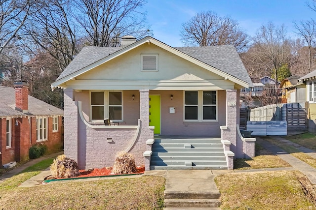 bungalow-style home featuring a porch