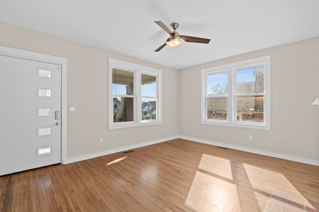 entryway featuring light hardwood / wood-style floors and ceiling fan