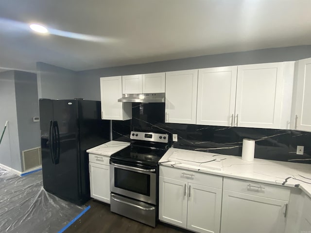 kitchen featuring white cabinets, stainless steel range with electric cooktop, decorative backsplash, light stone counters, and black refrigerator with ice dispenser