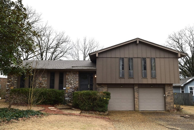 tri-level home featuring a garage