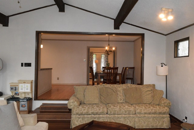 living room with an inviting chandelier, crown molding, wood-type flooring, and lofted ceiling with beams