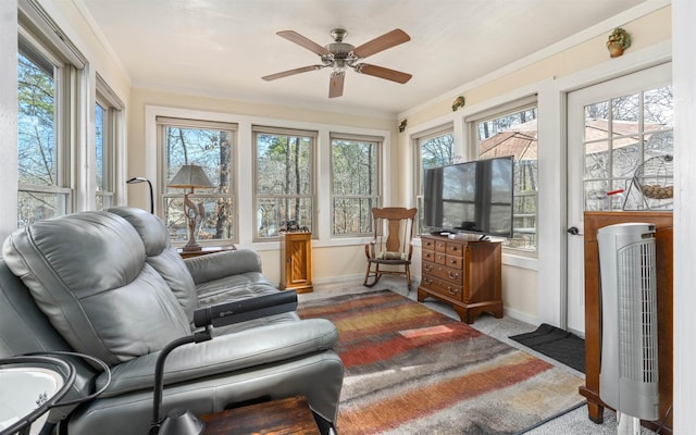 sunroom / solarium with ceiling fan