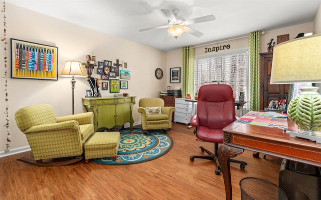 office space featuring hardwood / wood-style flooring and ceiling fan