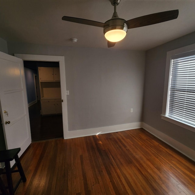 506 W Pleasure, Searcy, AR 72143 - unfurnished room featuring dark hardwood / wood-style flooring and ceiling fan
