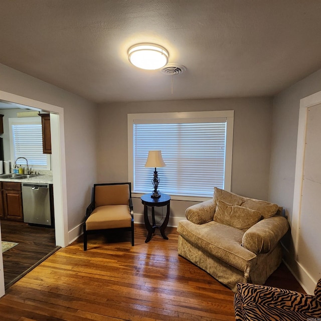 506 W Pleasure, Searcy, AR 72143 - sitting room featuring dark hardwood / wood-style floors, sink, and a textured ceiling