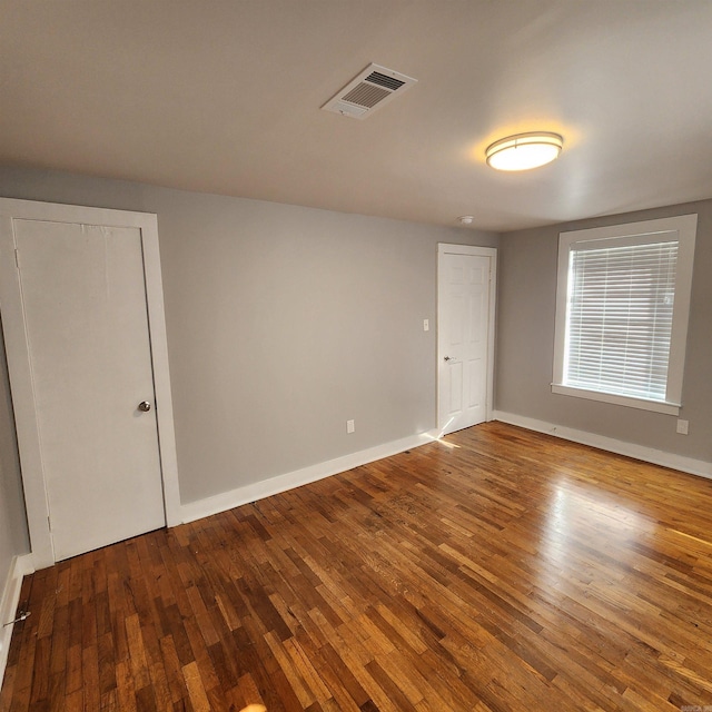 506 W Pleasure, Searcy, AR 72143 - unfurnished room with hardwood / wood-style flooring