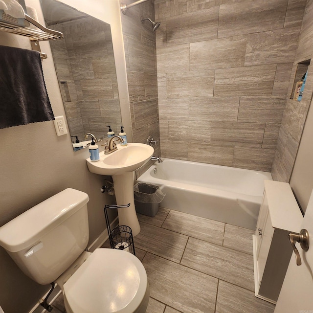 506 W Pleasure, Searcy, AR 72143 - bathroom featuring toilet and tiled shower / bath combo