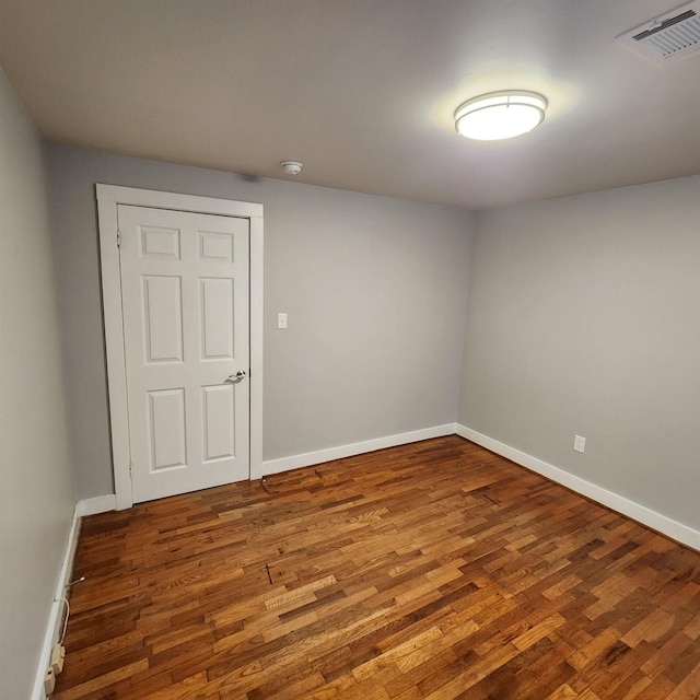 506 W Pleasure, Searcy, AR 72143 - empty room with wood-type flooring