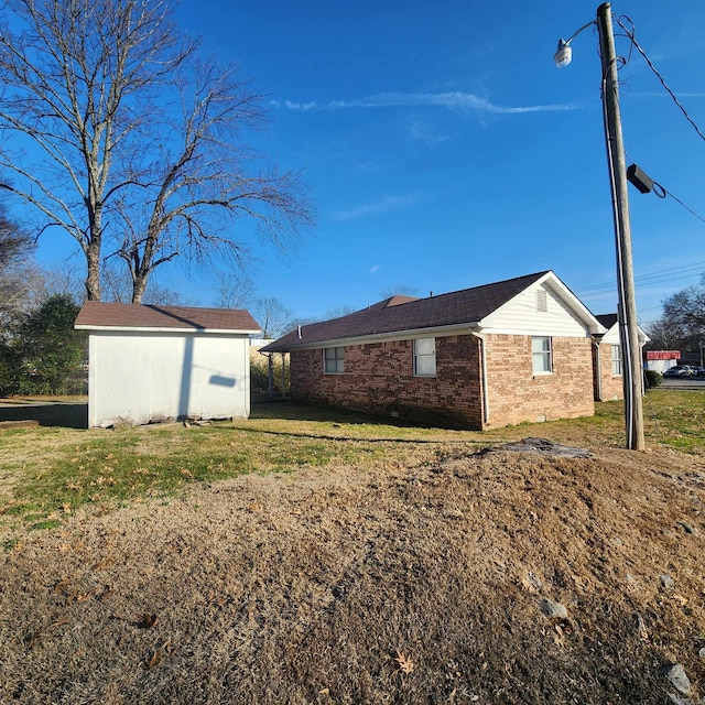 506 W Pleasure, Searcy, AR 72143 - view of home's exterior with a lawn