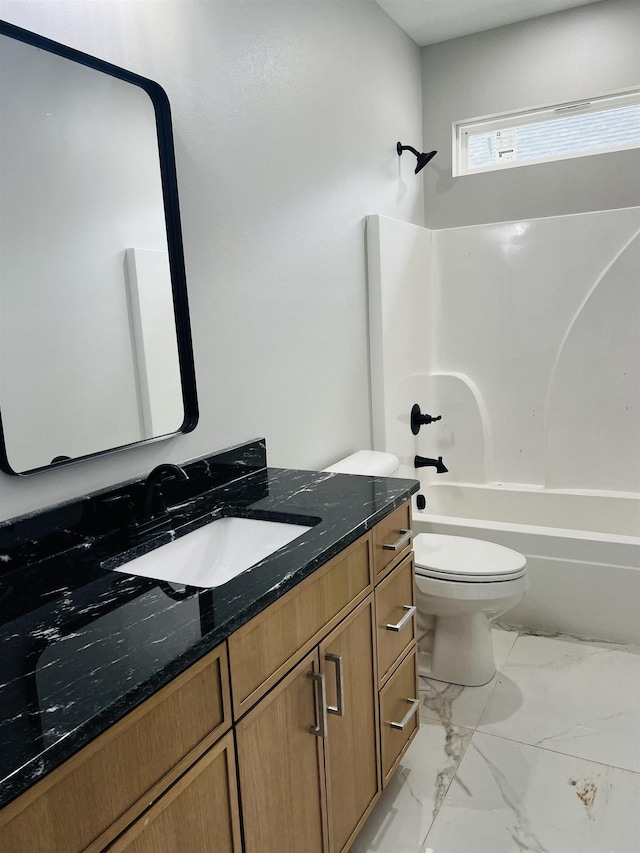 full bathroom with shower / washtub combination, vanity, and toilet