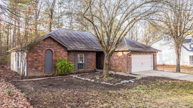 ranch-style home with a garage