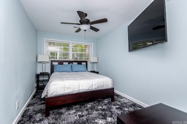 bedroom featuring ceiling fan and carpet flooring