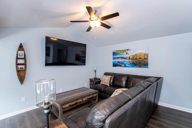 living room with ceiling fan, lofted ceiling, and dark hardwood / wood-style floors