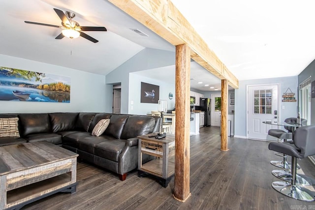 living room with lofted ceiling, dark hardwood / wood-style floors, and ceiling fan