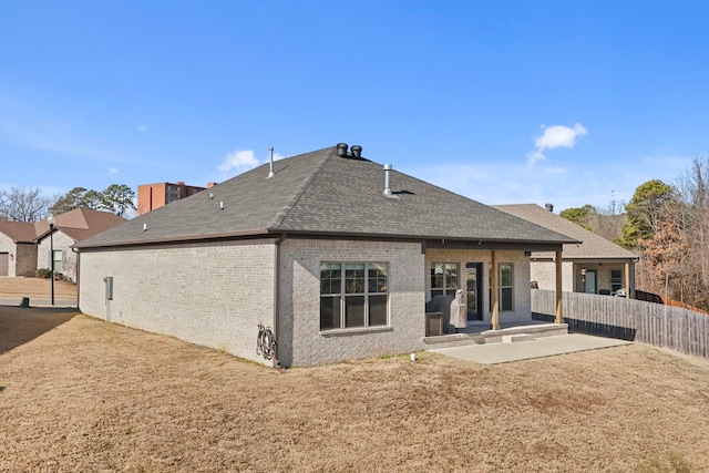 rear view of house featuring a patio